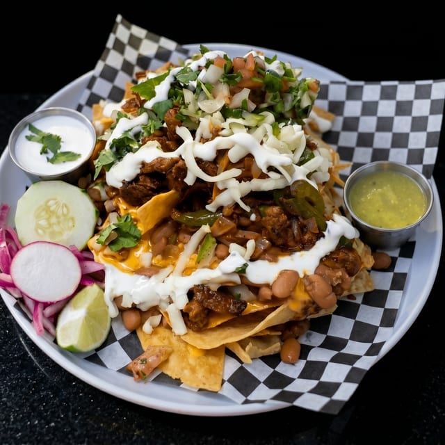 Nachos Al Pastor - Marinated Pork.